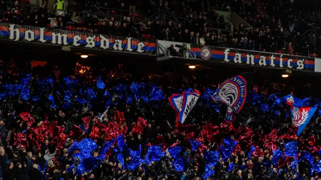 Crystal Palace fans waves flags at Selhurst Park