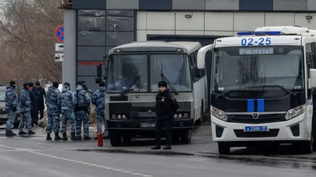 Russian police gather near Borisovsky cemetery in Moscow