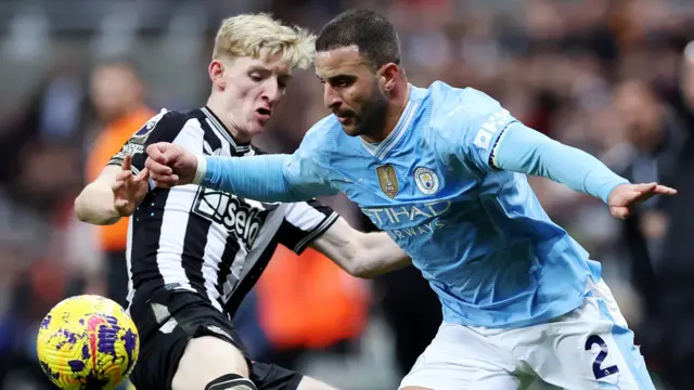 Newcastle's Anthony Gordon and Manchester City's Kyle Walker