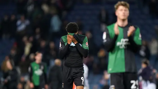 Coventry player puts head in shirt after full-time whistley