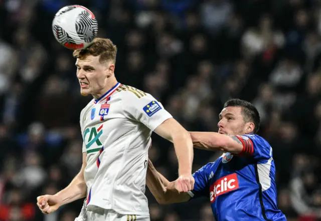 Jake O'Brien heads the ball