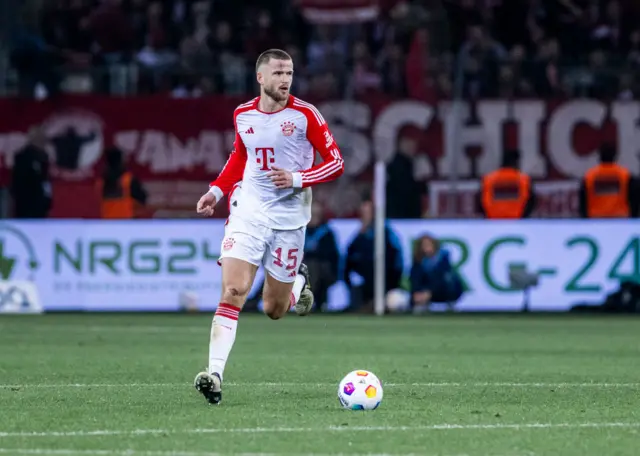 Eric Dier runs with the ball