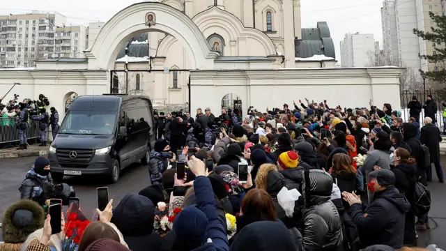 A hearse, which reportedly transports a coffin with the body of Russian opposition politician Alexei Navalny, is parked outside the Soothe My Sorrows church before a funeral service and farewell ceremony in Moscow, Russia, March 1,