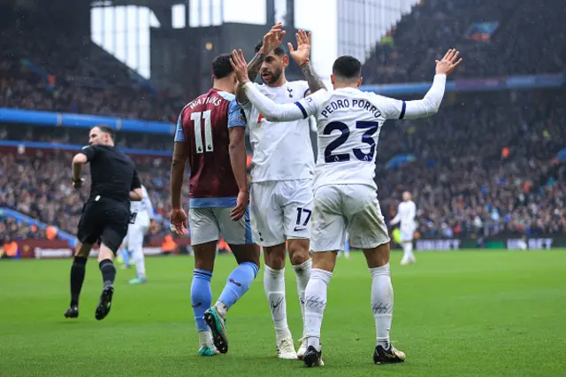 Ollie Watkins of Aston Villa and Cristian Romero and Pedro Porro