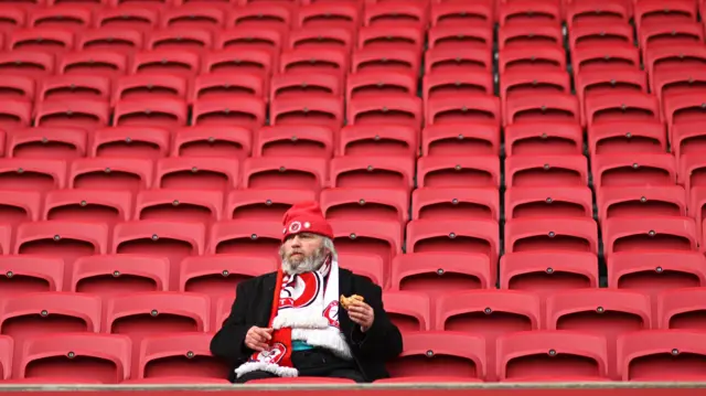 Bristol City fan in empty stand