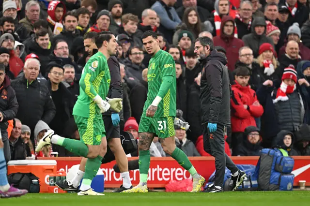 Stefan Ortega runs on the pitch as Ederson walks off