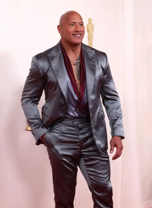 Dwayne Johnson arriving on the red carpet at the 96th Annual Academy Awards