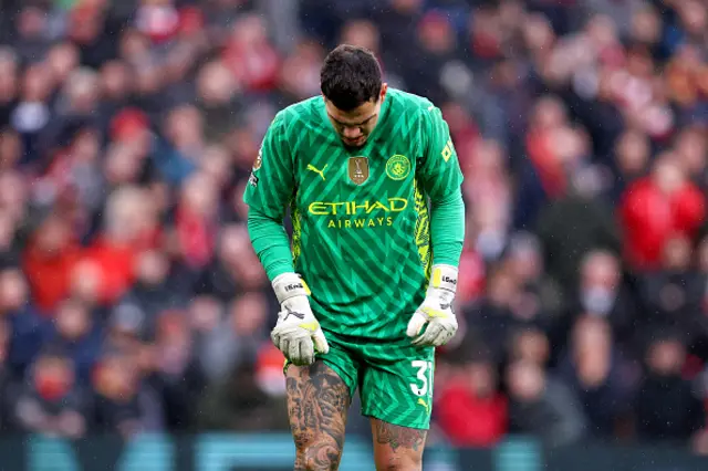 Ederson of Manchester City reacts after a collision