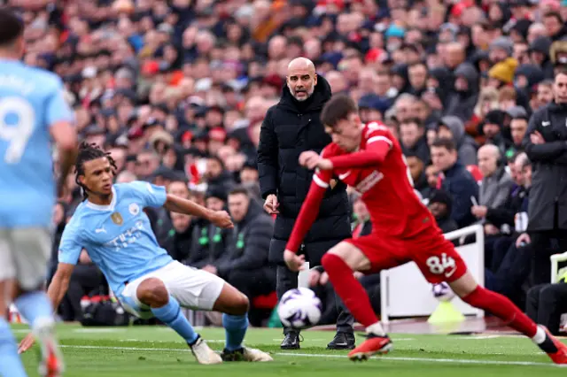 Pep Guardiola, Manager of Manchester City, reacts on the touchline