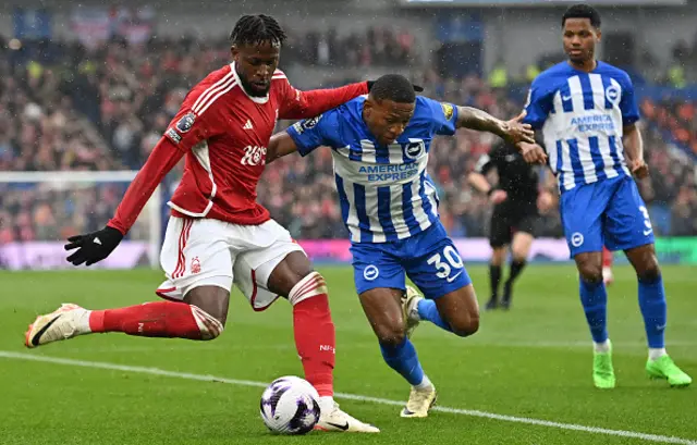 Pervis Estupinanm vies with Nottingham Forest's Divock Origi