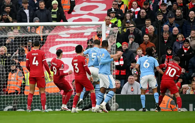 : John Stones of Manchester City scores his team's first goal