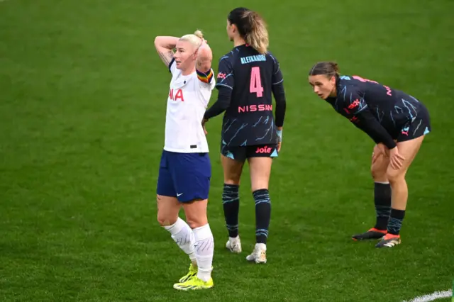 England holds her head in disbelief after missing a huge chance.