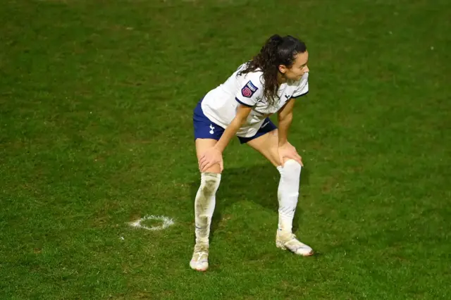 Ayane commiserates after missing her penalty.