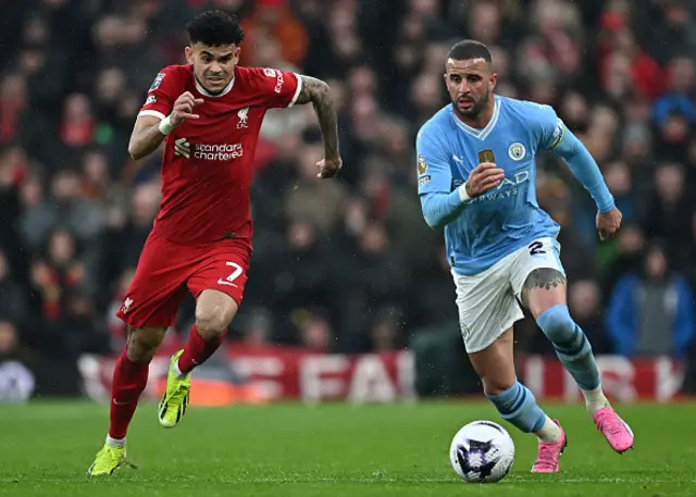 Kyle Walker vies with Liverpool's Colombian midfielder Luis Diaz