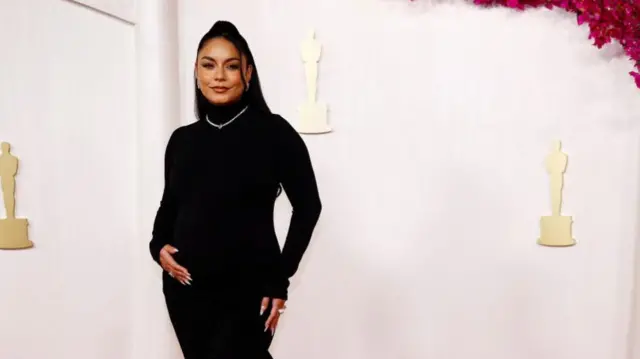 Vanessa Hudgens, who is pregnant, poses on the red carpet during the Oscars arrivals at the 96th Academy Awards in Hollywood, Los Angeles, California, U.S., March 10, 2024