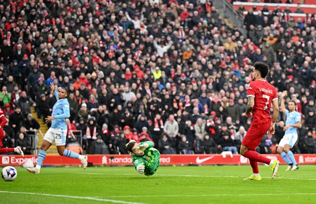 Luis Diaz of Liverpool scores a goal past Ederson, ruled offside