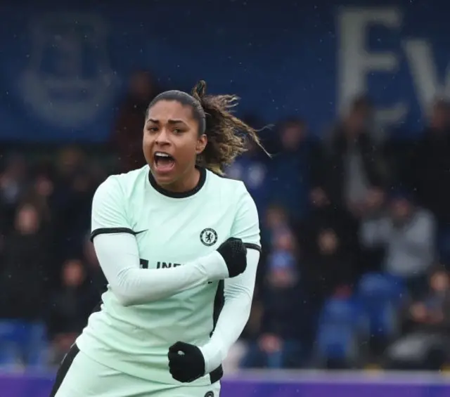 Macario celebrates her winning goal.