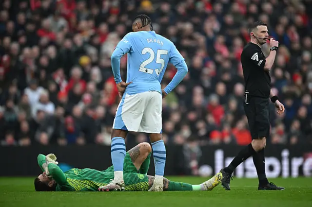 Ederson lays on the pitch