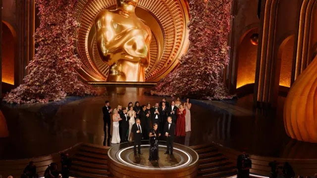 Director Christopher Nolan and Producers Emma Thomas and Charles Roven win the Oscar for Best Picture for "Oppenheimer" during tThe Oscars show at the 96th Academy Awards in Hollywood, Los Angeles, California, U.S., March 10, 2024.