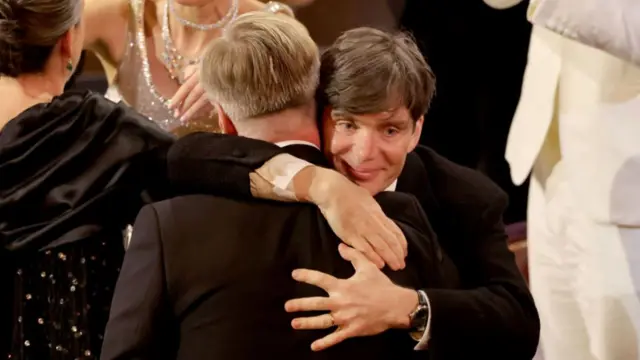 (L-R) Christopher Nolan and Cillian Murphy accept the Best Picture award for "Oppenheimer" during the 96th Annual Academy Awards at Dolby Theatre on March 10, 2024 in Hollywood, California.