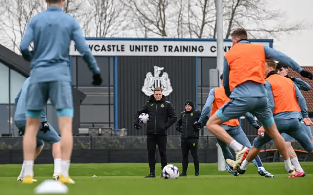 Newcastle United Head Coach Eddie Howe looks on