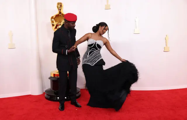 Bobi Wine and wife Barbie on the red carpet.