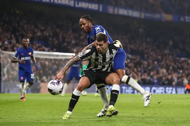 Raheem Sterling of Chelsea and Bruno Guimaraes battle for the ball