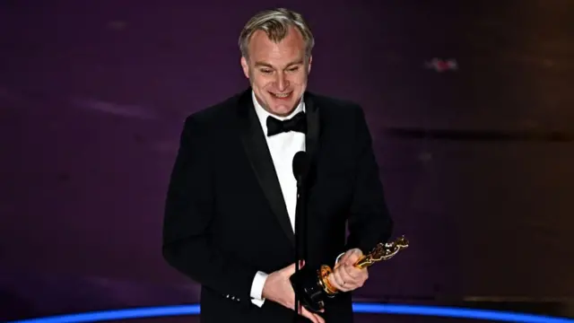 British director Christopher Nolan accepts the award for Best Director for "Oppenheimer" onstage during the 96th Annual Academy Awards at the Dolby Theatre in Hollywood, California on March 10, 2024