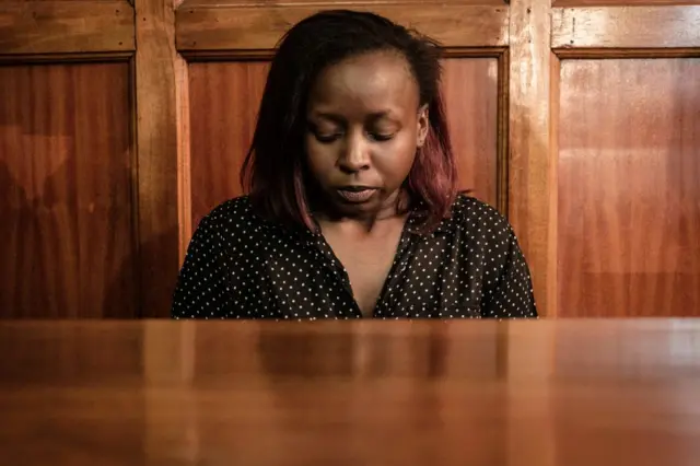 TV journalist and anchor Jacque Maribe sits in the dock next to her fiance Joseph Irungu (unseen) during their trial for allegedly killing Monica Kimani, a South Sudan based Kenyan businesswoman, on October 9, 2018