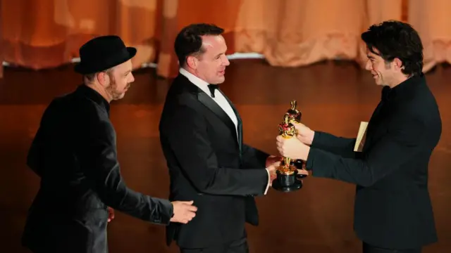 Tarn Willers and Johnnie Burn win the Oscar for Best Sound for "The Zone of Interest" during the Oscars show at the 96th Academy Awards in Hollywood, Los Angeles, California, U.S., March 10, 2024.