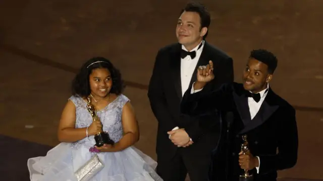 Dana Atkinson (L) Kris Bowers (R) and Ben Proudfoot (C) on stage after winning the Oscar for Best Documentary Short Film ''Last Repair Shop'' during the 96th annual Academy Awards ceremony at the Dolby Theatre in the Hollywood neighborhood of Los Angeles, California, USA, 10 March 2024.