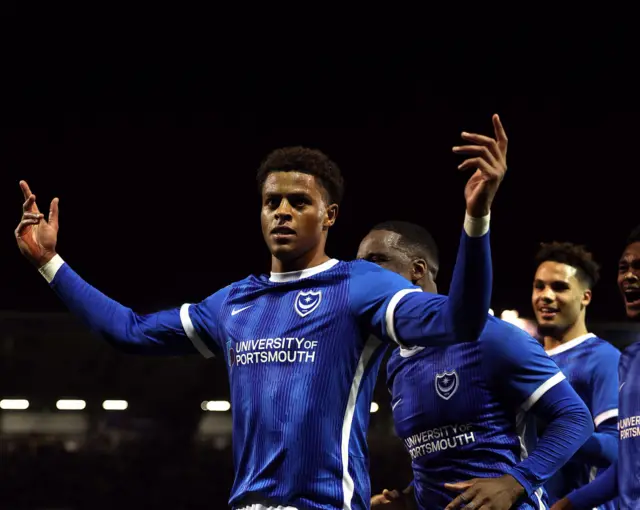 Kusini Yengi of Portsmouth celebrates scoring from the penalty spot