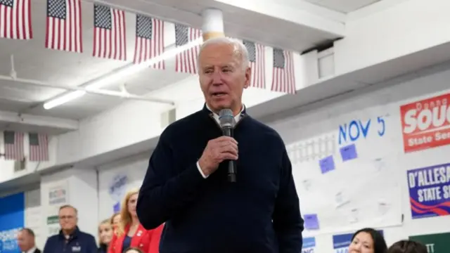 U.S. President Joe Biden speaks during a visit to his campaign field office in Manchester, New Hampshire, U.S., March 11, 2024