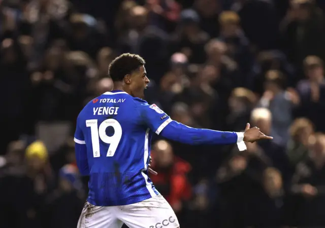 Kusini Yengi of Portsmouth celebrates scoring a second goal