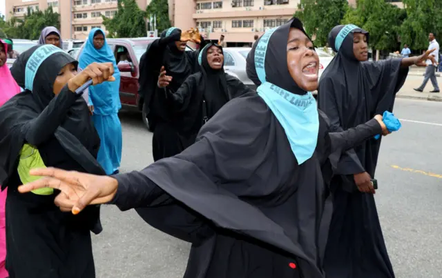 Supporters chant slogans to march and press for the release of Nigerian Shiite Muslim cleric Ibrahim Zakzaky on May 14, 2018 in Abuja