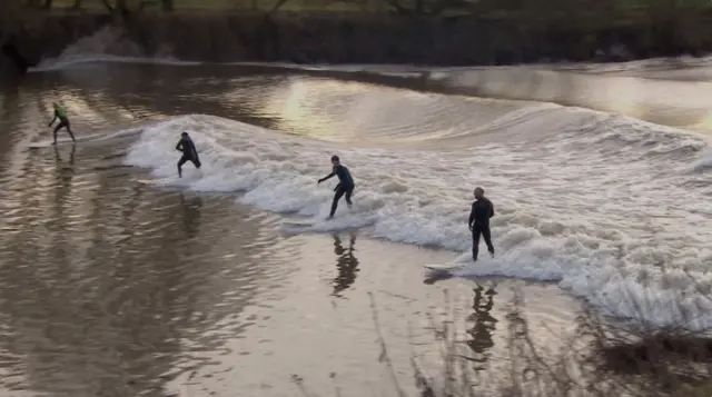 Severn Bore with surfers