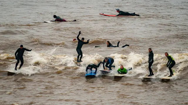 Surfers enjoying the waves