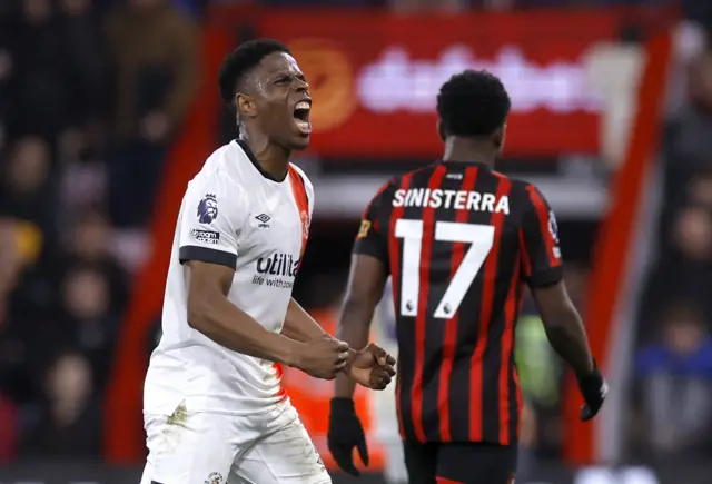 Ogbene shouts in delight after Luton's third.