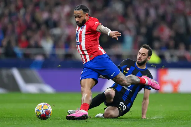 Hakan Calhanoglu brings down Memphis Depay