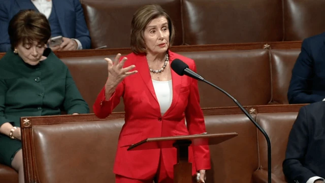 Nancy Pelosi speaking in House of Representative chamber