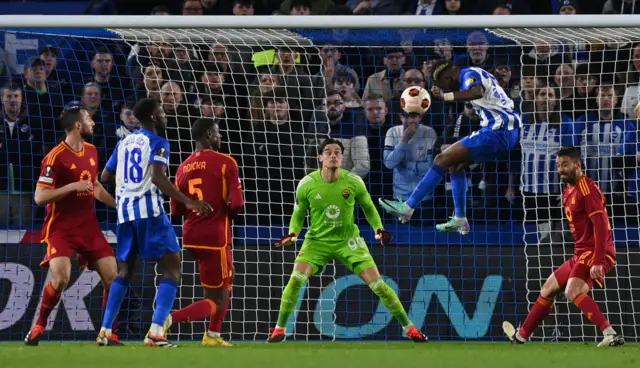 aDINGRA HEADS AT GOAL FOR BRIGHTON.