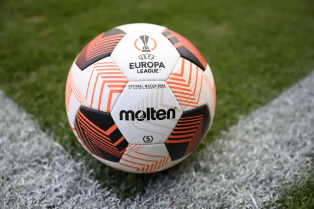 Europa League ball perched in the corner quadrant.