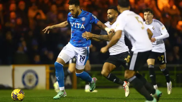 Stockport County and Salford City in action in League Two