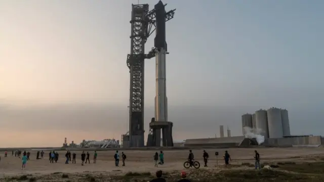 Spectators gather around Starship ahead of launch