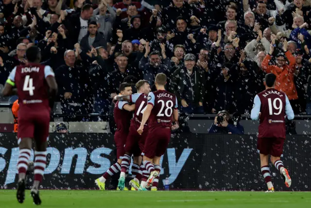 West Ham players mob Bowen after his goal