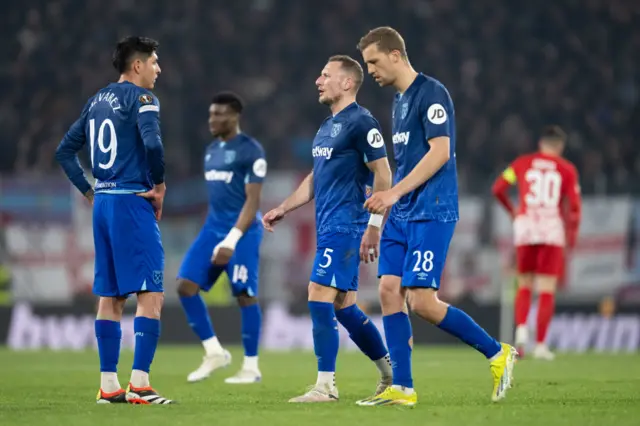 West Ham players trudge to kick off after conceding in Germany.