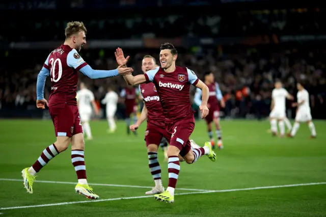 Cresswell high fives Bowen after he scores their third.