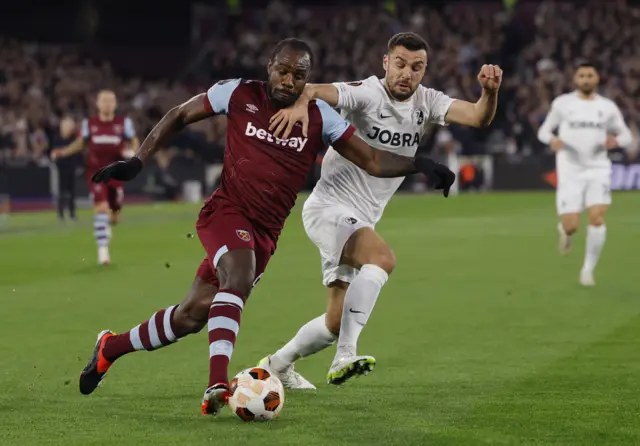 Antonio bursts past a defender into the box.