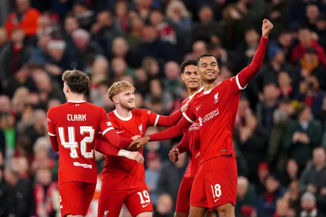 Gakpo celebrates his second goal with teammates