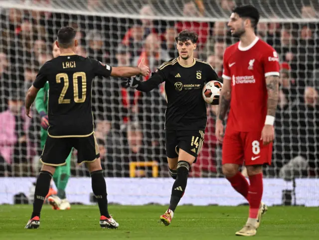 Birmancevic  celebrates his goal for Sparta at Anfield